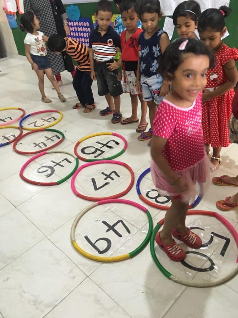 Learning numbers while playing Hopscotch