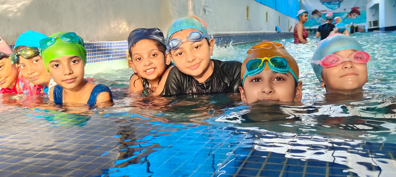 Students at the Modern School swimming pool
