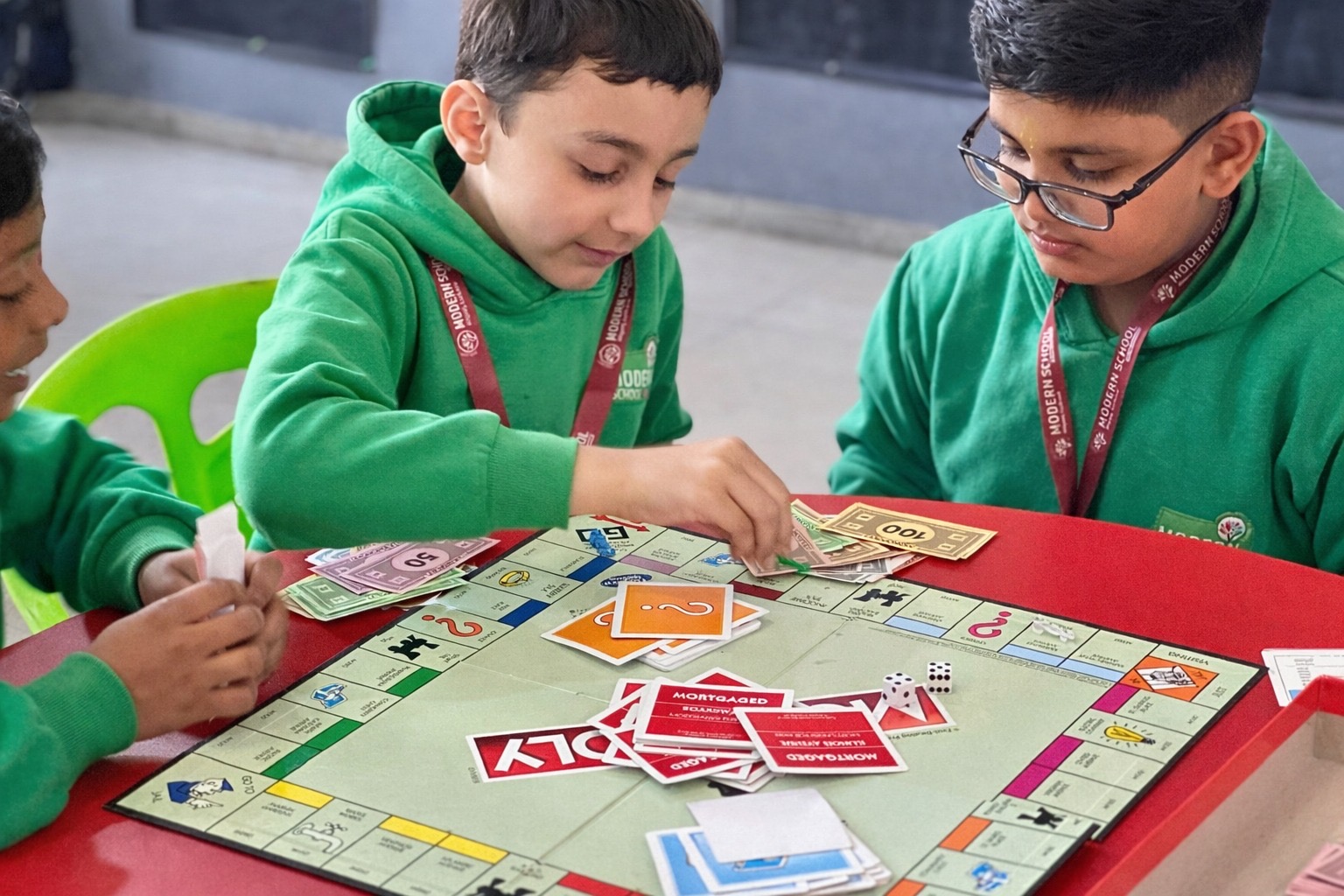 Students engage in a collaborative board game activity