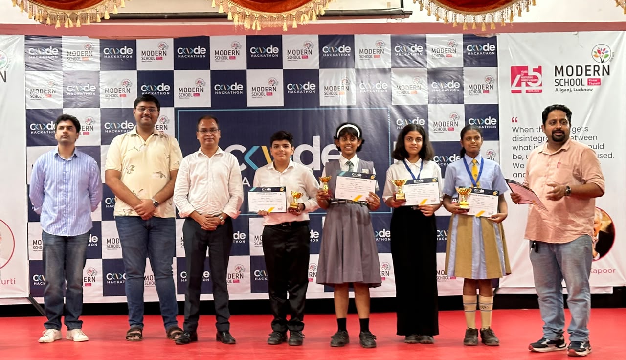 Junior participants with certificates and trophies at Code Hackathon 2026